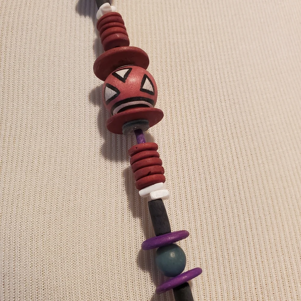 African inspired long wooden bead necklace in maroon, purple & green